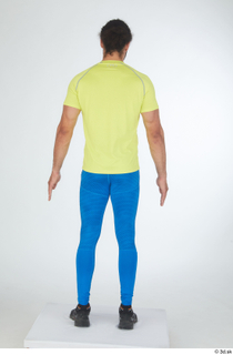 Simeon black sneakers blue leggings dressed sports standing whole body…